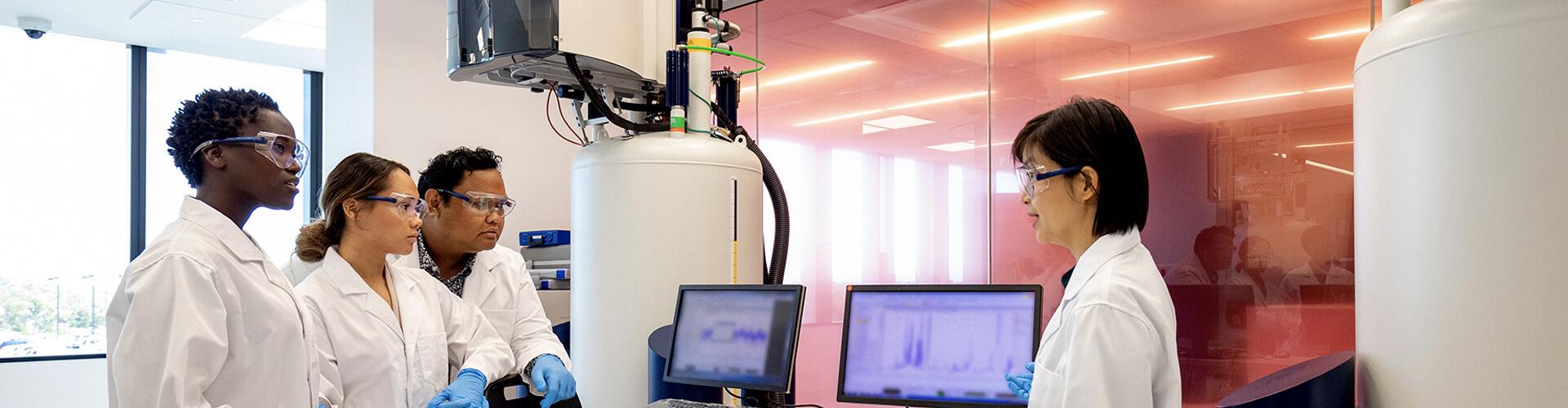 Student researchers in a lab